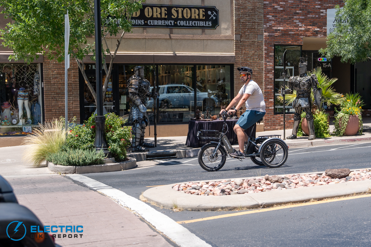 man riding Lectric XP Trike in a city